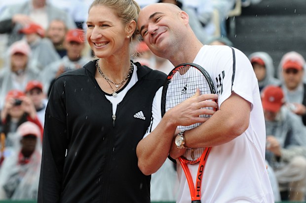 FRANCE - JUNE 06:  Andre Agassi and Steffi Graf in Roland-Garros for the Andre Agassi Foundation in Paris, France on June 06th, 2009 - Steffi Graf and Andre Agassi playing in Roland-Garros Tennis Tournament.  (Photo by Laurent ZABULON/Gamma-Rapho via Getty Images)