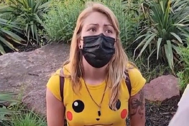 The woman was confronted at the theme park.