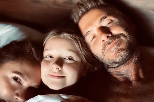 David and Victoria Beckham and their daughter Harper