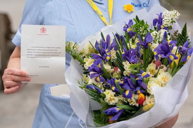 General view of flowers from Queen Elizabeth II to staff at St Bartholomew's Hospital, London, on the anniversary of the first national lockdown to prevent the spread of coronavirus. (Photo: March 23, 2021)