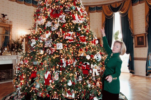 Former US First Lady Hillary Clinton with her White House Christmas tree in 1997.
