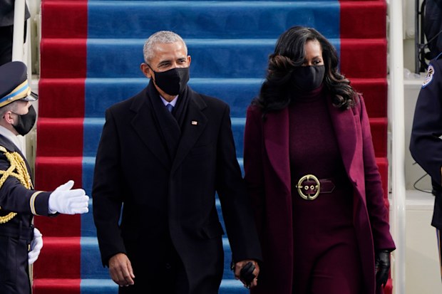 Former President Barack Obama and his wife Michelle arrive for the 59th Presidential Inauguration at the U.S. Capitol for President-elect Joe Biden in Washington, Wednesday, Jan. 20, 2021. (AP Photo/Patrick Semansky, Pool)