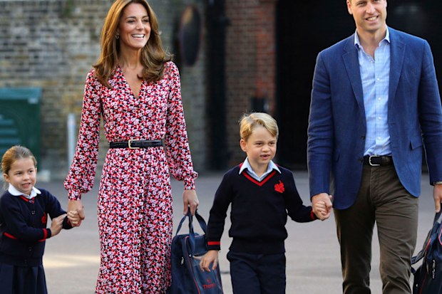 Britain's Princess Charlotte, left, with her brother Prince George and their parents Prince William and Kate, Duchess of Cambridge, arrives for her first day of school at Thomas's Battersea in London, Thursday Sept. 5, 2019