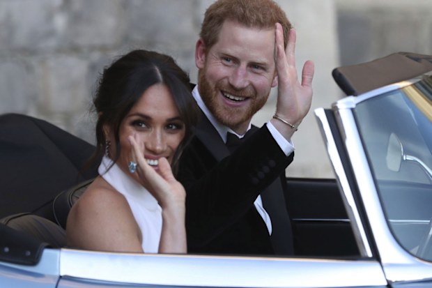 Prince Harry and Meghan Markle drive to their wedding reception.