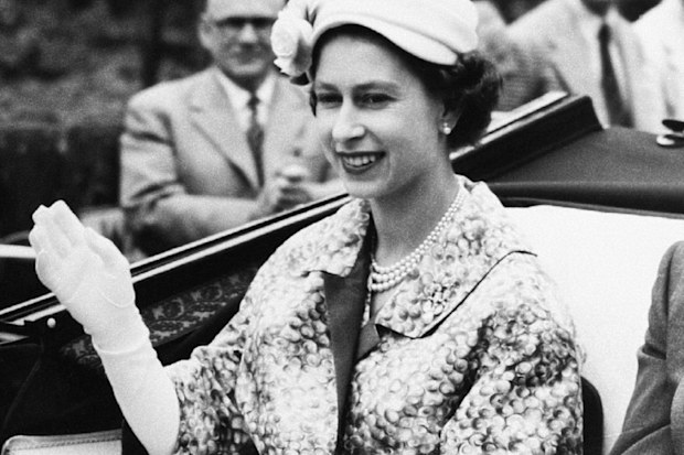 Queen Elizabeth on the way to the races in June 1957. 