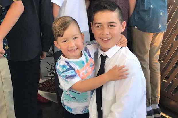 Special bond between 12-year-old cancer survivor and his sick baby brother