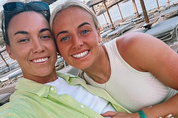 Mackenzie Arnold with her partner and fellow footballer Kirsty Smith.