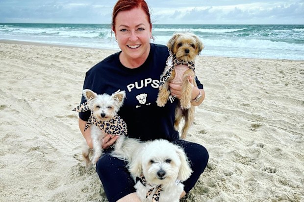 Shelly Horton with her three dogs