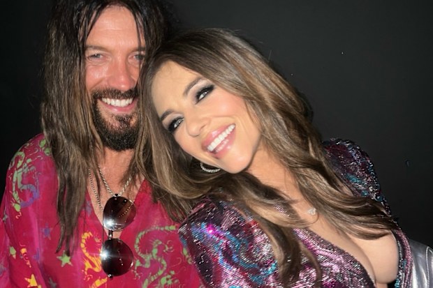 Elizabeth Hurley and Billy Ray Cyrus at the premiere of Something Beautiful
