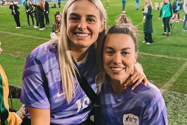 Mackenzie Arnold with her partner and fellow footballer Kirsty Smith.