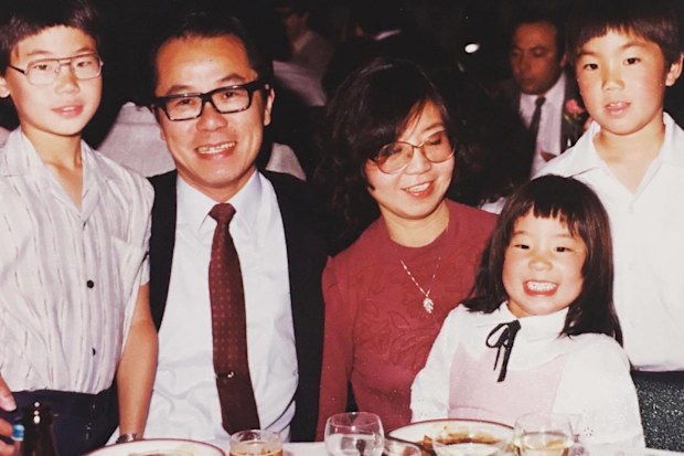 Candice Hung (second right) with her family, including her mother (centre) who died of stomach cancer when Candice was 12.