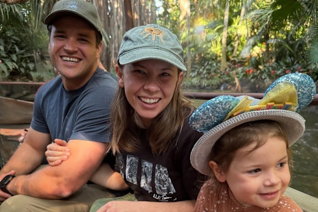 Bindi Irwin with her husband and daughter at Disneyland.