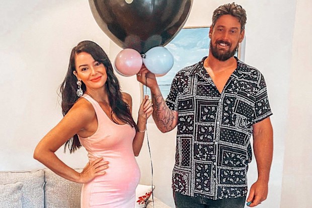 Jade Redmond with husband Craig during her pregnancy with her first child, Harper.