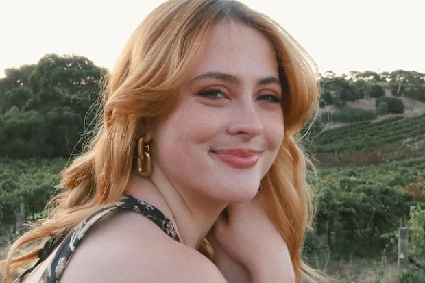 Lucy Neville smiles for the camera.