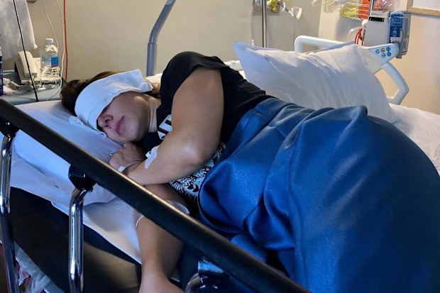 Michelle Taylor in hospital during MS treatment.