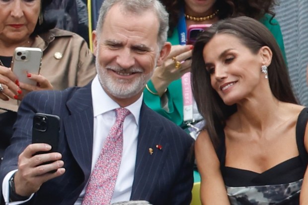King Felipe VI of Spain and Queen Letizia take a selfie at the opening ceremony 