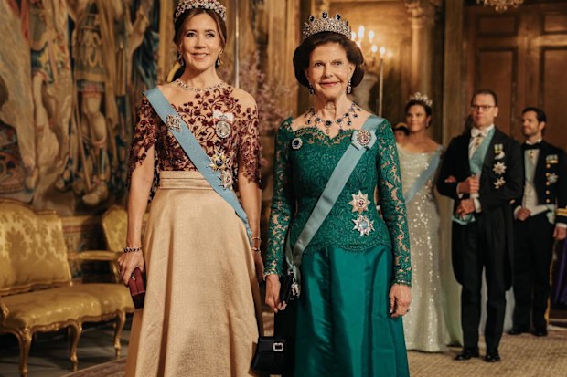 Queen Mary of Denmark and Queen Silvia of Sweden at a Gala Dinner to mark the Danish royals' first state visit since becoming monarchs