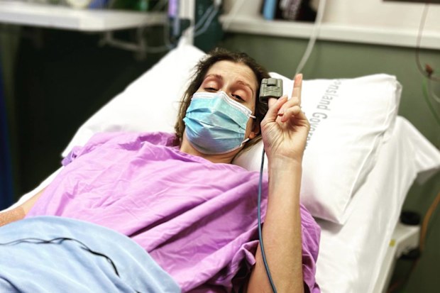 Ellie Angel-Mobbs during one of her many endometriosis-related hospital stays.