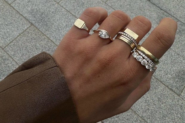 A stack of rings worn by Alana Maria Jewellery founder Alana Ellis.