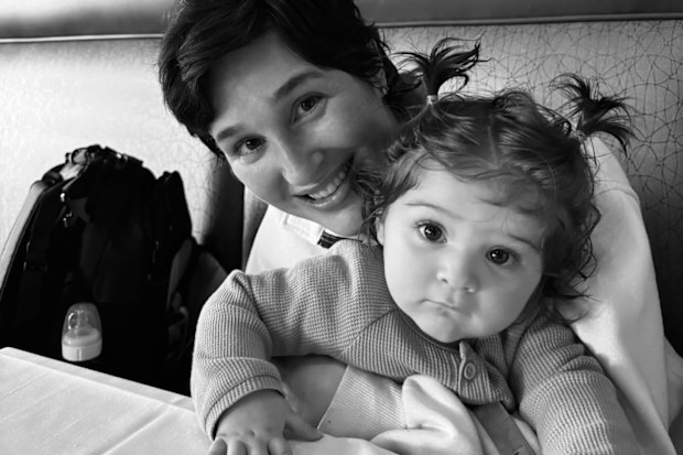 Jackie Miller James with her baby after suffering an aneurysm rupture at nine months pregnant.