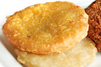 Typically Aussie junk food, potato cakes and chicken pieces in batter
