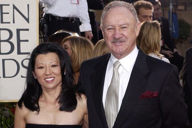 FILE - Actor Gene Hackman arrives with his wife, Betsy Arakawa, for the 60th Annual Golden Globe Awards in Beverly Hills, Calif., Sunday, Jan. 19, 2003. (AP Photo/Mark J. Terrill, File)