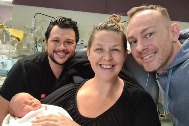 Lunaria Gaia with Joel and Dan after giving birth to baby Archer.
