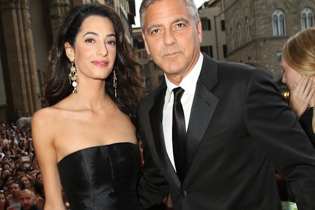 George Clooney and Amal Alamuddin attend the Celebrity Fight Night gala celebrating Celebrity Fight Night In Italy in September 2014 in Florence, Italy