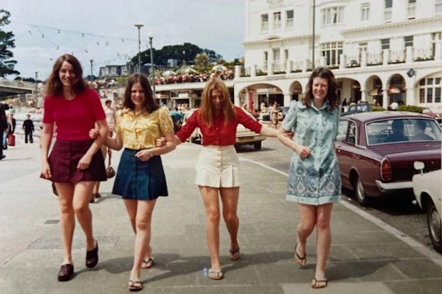 Four lifelong friends replicated this favourite vacation photo in Torquay, Devon, over 50 years later.