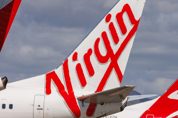 Townsville, Queensland - 28 July 2021: Virgin Australia and Qantas tails on display at Townsville Airport in far North Queensland