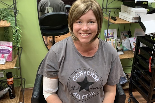 Fiona May in a wig after losing her hair during cancer treatment.