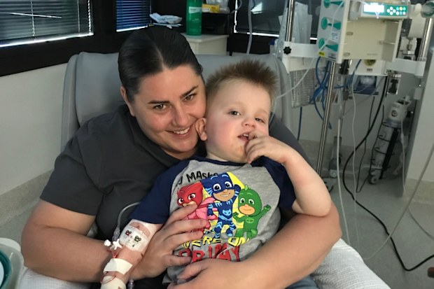 Spencer McPherson with his mum in hospital.