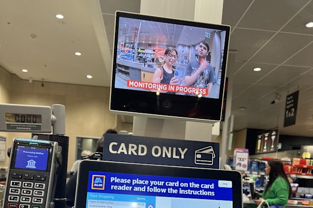 Aldi self check out Jo Abi and son Giovanni
