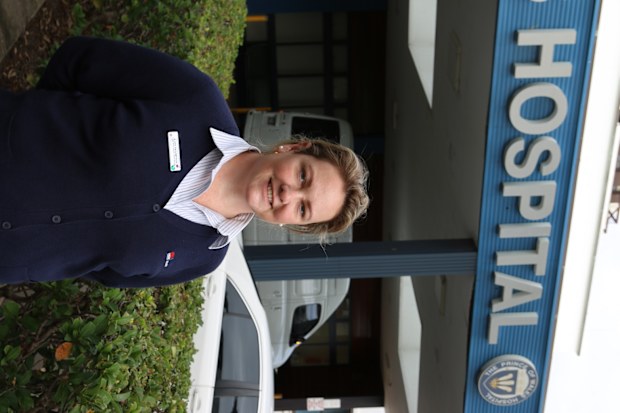 Kate Frampton POW Hospital Foundation at front of hospital