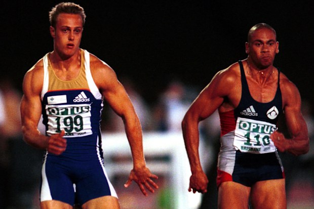 Matt Shirvington (left) and Patrick Johnson racing in Brisbane in 2000.