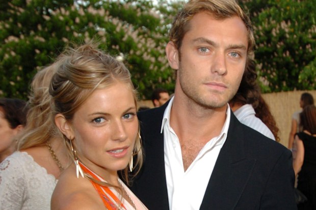 Sienna Miller and Jude Law in London in June 2004.