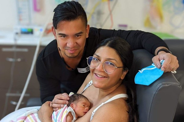 Renato and Vanessa Churches in hospital after welcoming their son, Bryson.