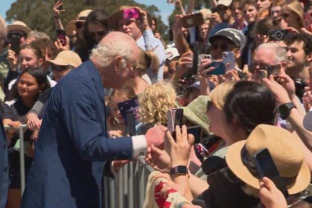 King Charles greets members of the public outside the War Memorial.