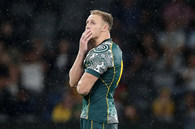 Reece Hodge of the Wallabies reacts after missing a late kick at goal.