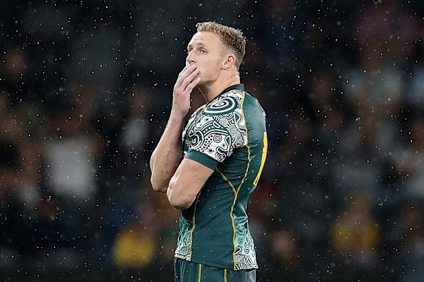 Reece Hodge of the Wallabies reacts after missing a late kick at goal.