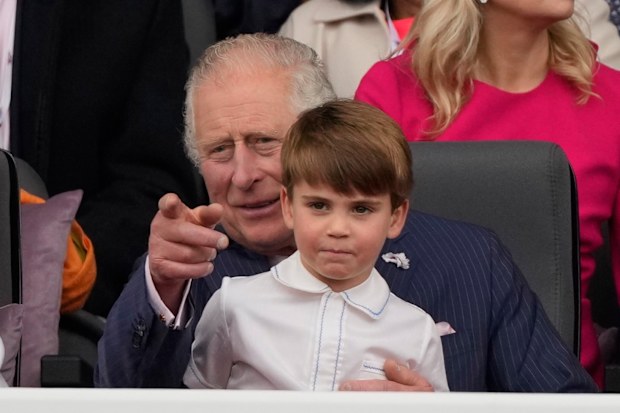 Prince Charles and Prince Louis attend the Platinum Jubilee Pageant outside Buckingham Palace in London, Sunday, June 5, 2022, on the last of four days of celebrations to mark the Platinum Jubilee. 