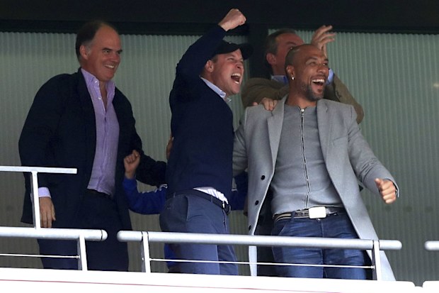 Prince William reacts with joy as Aston Villa is promoted to Premier League