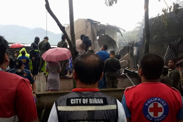 Investigators are trying to determine why the medical airlift ended in tragedy.  (Philippine Red Cross via AP)