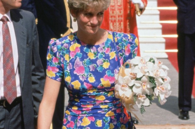 SPAIN - MAY 21:  Diana, Princess of Wales outside the Town Hall in Seville with bodyguard Colin Trimming, She is wearing a dress designed by fashion designers Bellville Sassoon  (Photo by Tim Graham Photo Library via Getty Images)