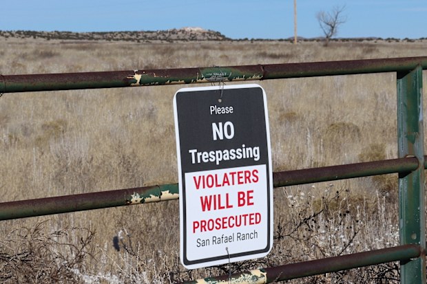 A fence marks the boundary of the San Rafael Ranch, which was previously owned by Jeffrey Epstein and called the Zorro Ranch, on Jan. 31, 2026, near Stanley, N.M.  
