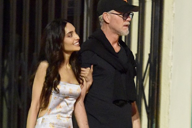 Priya Jain seen clinging to the arm of Eric Dane in LA on May 11, 2025.