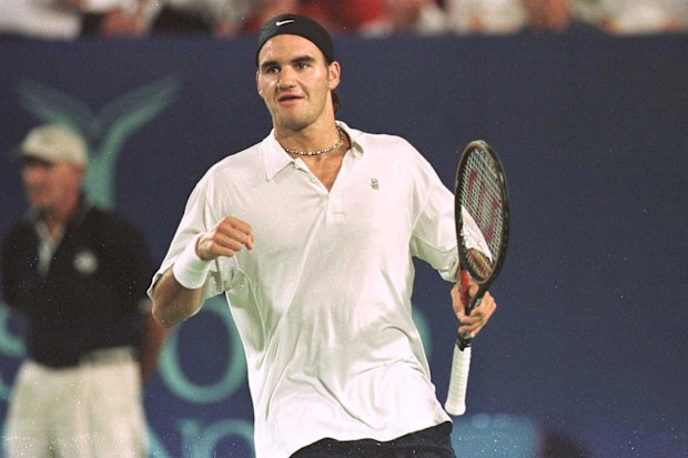 Switzerland's Roger Federer celebrates defeating Australia's Richard Fromberg in 2001.  (Photo by Jon Buckle/EMPICS via Getty Images)
