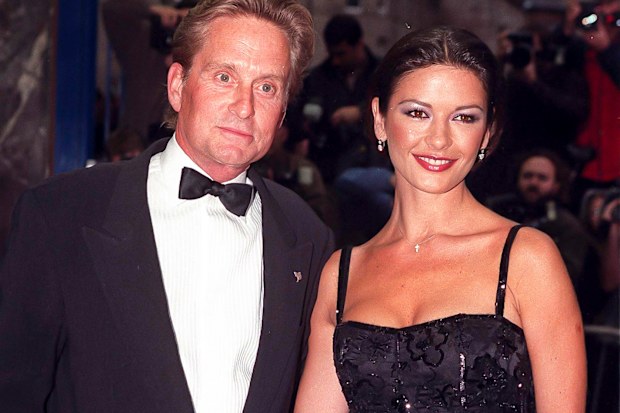 Catherine Zeta Jones, and Michael Douglas  attend The Premiere of, Entrapment, in Edinburgh,, on June 30, 1999  in, Edinburgh, Scotland.