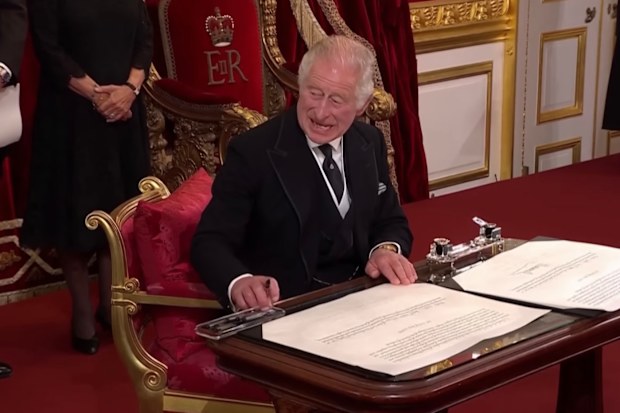 King Charles shoos pen tray away at royal proclamation