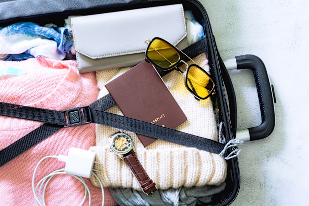 Luggage and travel,costume Travel equipment. Passport, suitcase, sunglasses, travel map fee prepared for the trip,phone charger